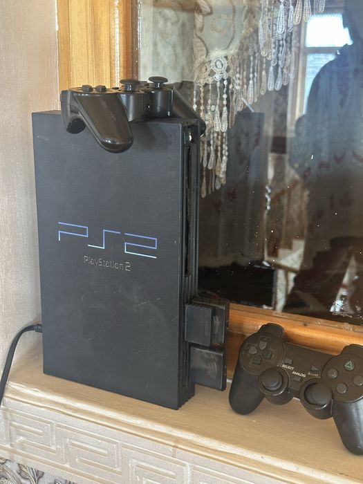 Playstation2 holati yaxshi ichida uyini yoq
