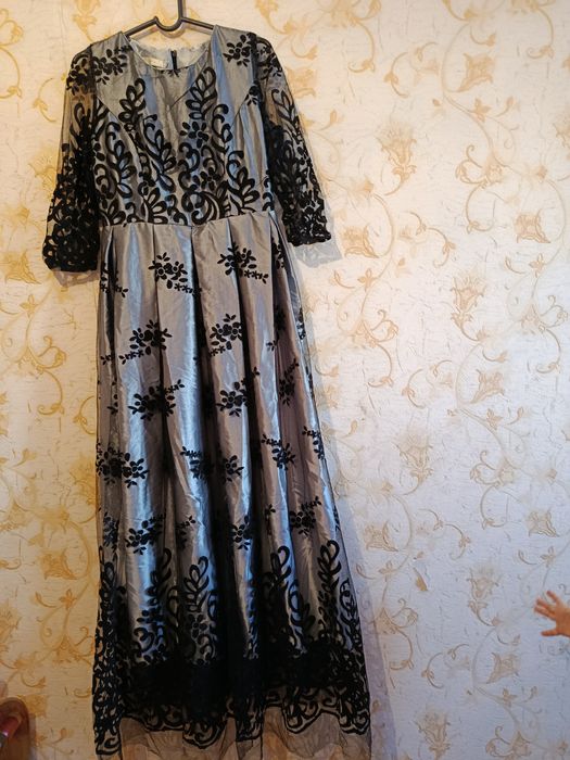 Женские одежды..