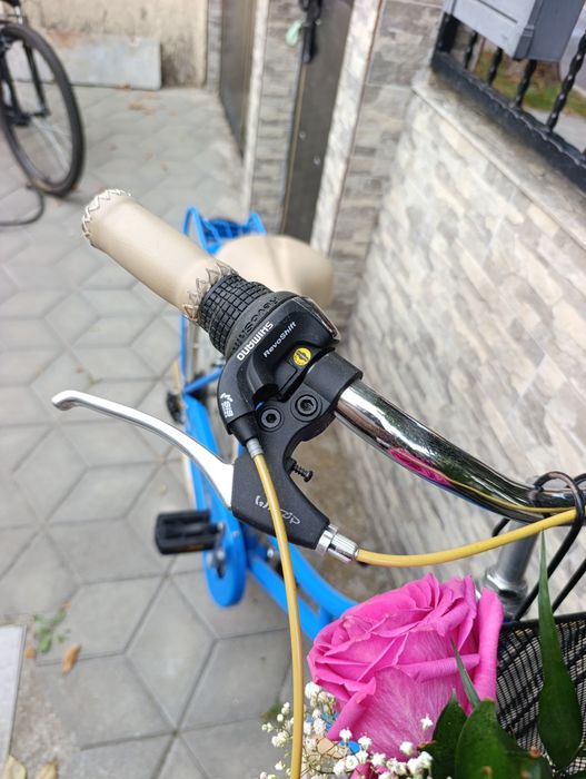 Vând bicicleta dama roti 26