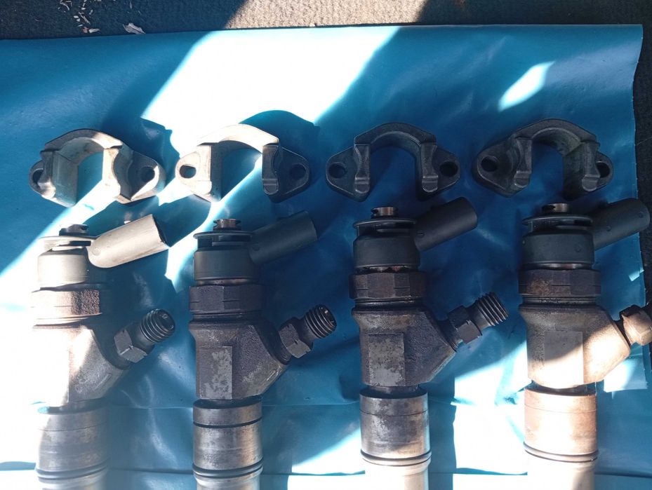 Injectoare bmw x3 163cp