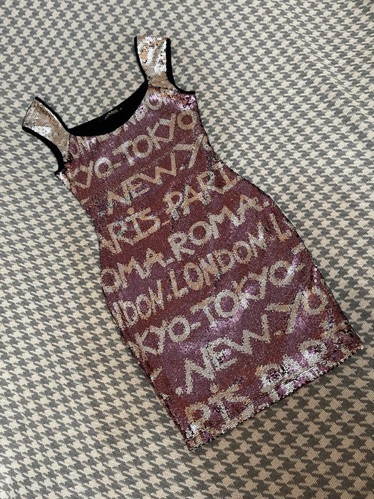 Женское мини платье с пайетками