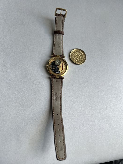 18 k aur Omega Constellation Day-Date,quartz ref.196.1070 cal.1444