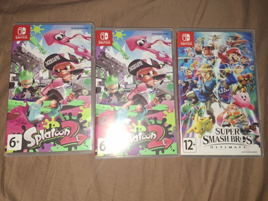 Игры картриджи Splatoon 2 и Super smash bros