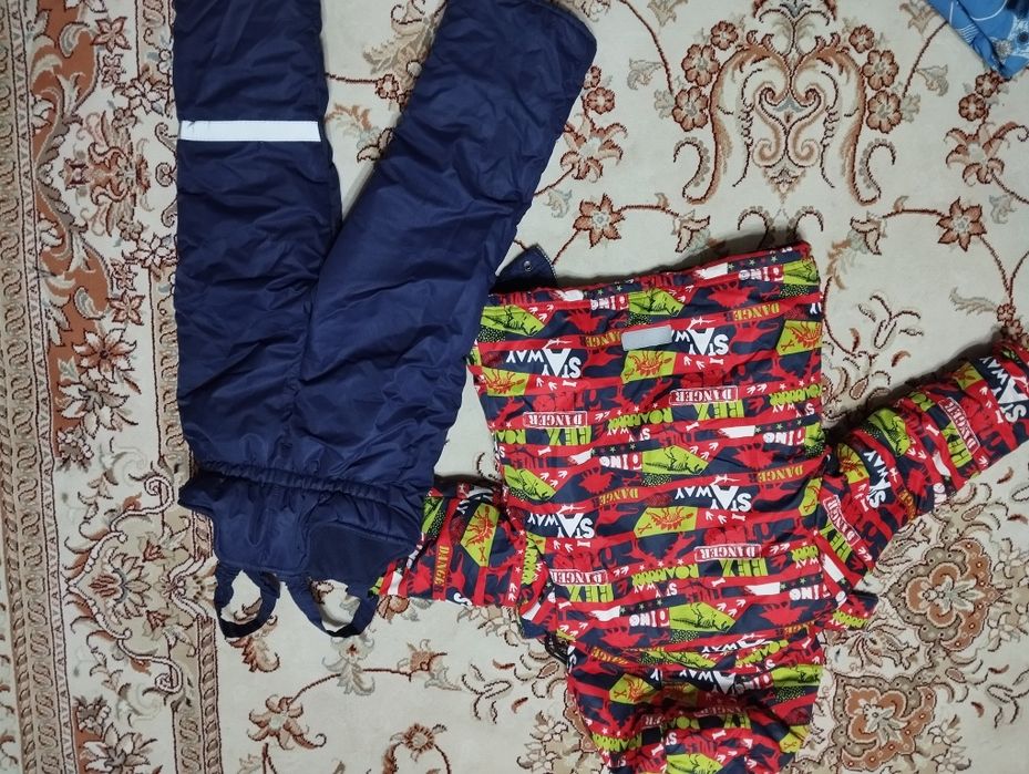 Продам зимний комбинезон для мальчика.