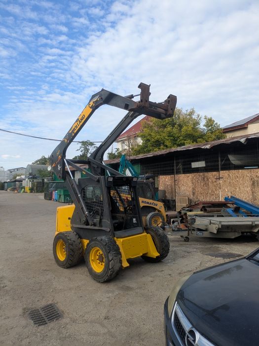 Vând miniincarcator frontal New Holland (Bobcat)