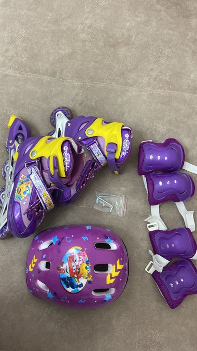 Роликовые коньки