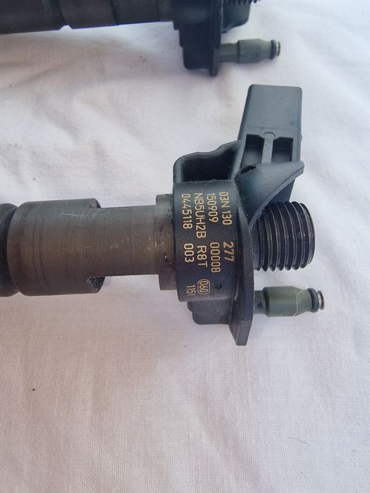 Vand injectoare de passat B8 varianta de 240cp