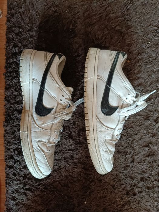 Nike Dunk Low black swoosh