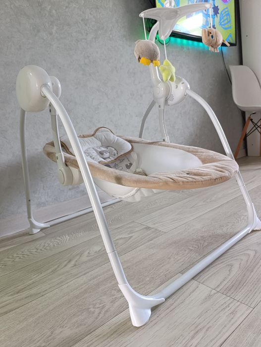 Электрическая детская качеля