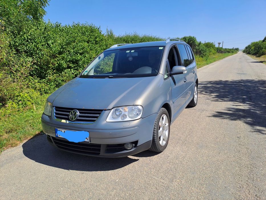 WW  Touran. 2.0 TDI  / SCHIMB