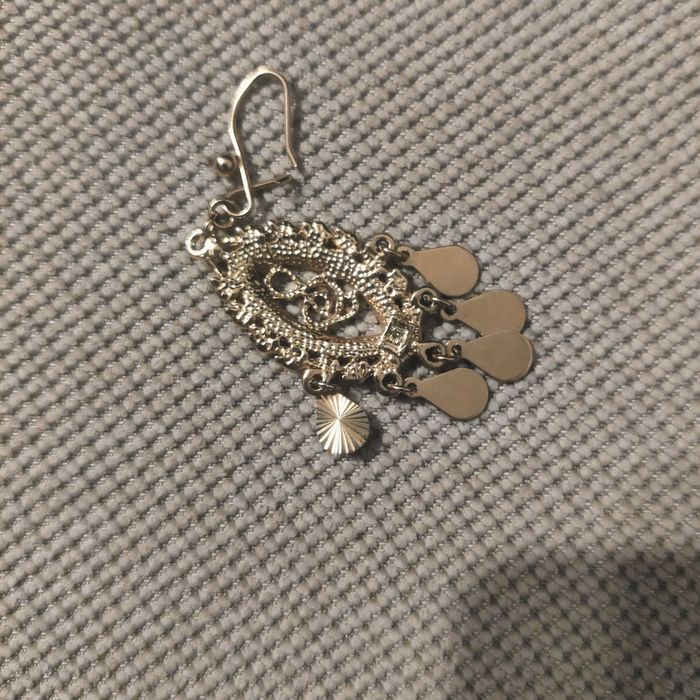 Лого на нота със камъчета