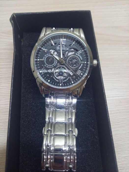 Серебряные золотые часы