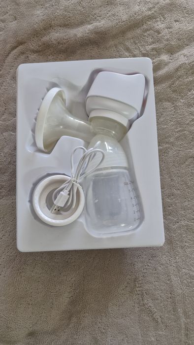 Продам молокоотсос электрический