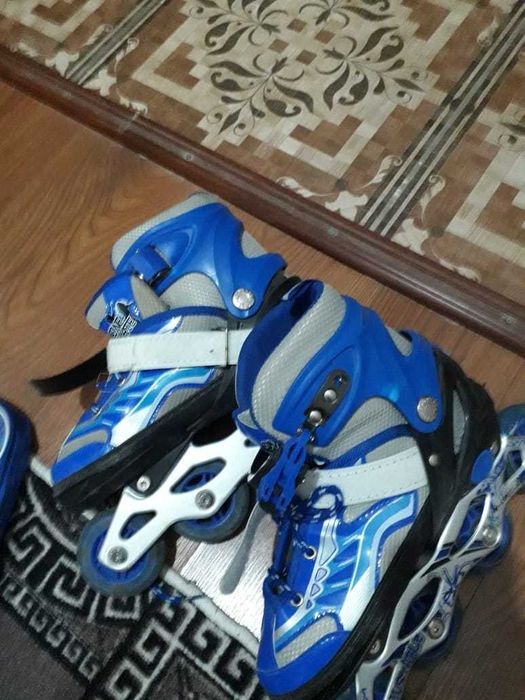 Роликовые коньки