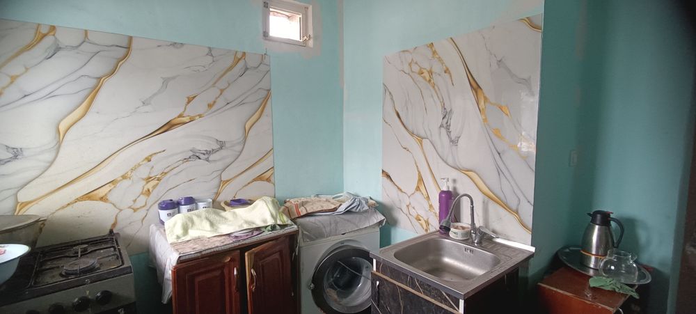 Мартобеде бір аулада екі времянка