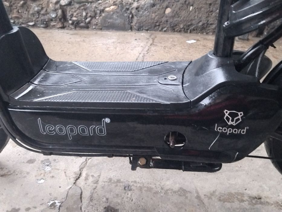 Леопард электраскутер