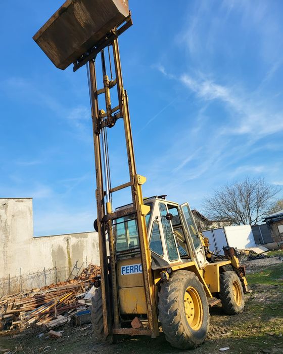 Buldoexcavator si manitou Buffalo Ferro