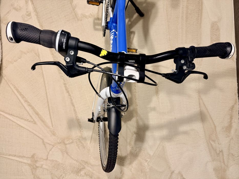 Woom 4 2025 albastru folosit 30 km