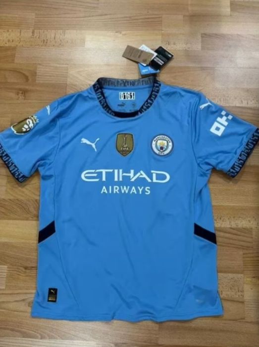 Abduqodir Khusanovni dasxati tushurilgan futbolka