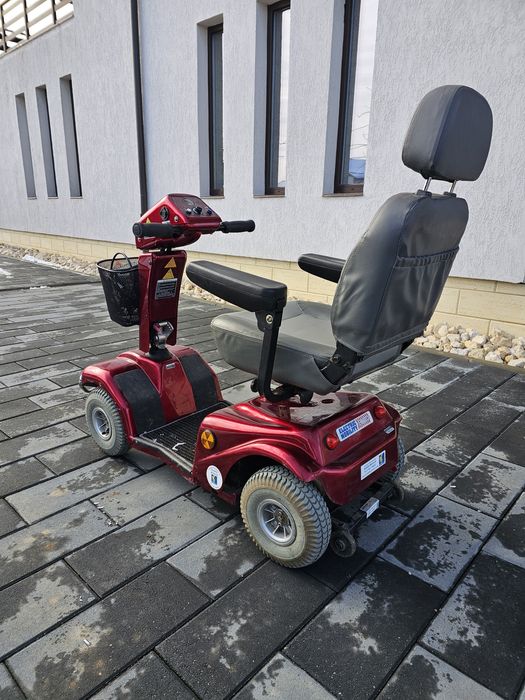 Scuter electric carut scaun persoana cu dizabilitati  Rascal