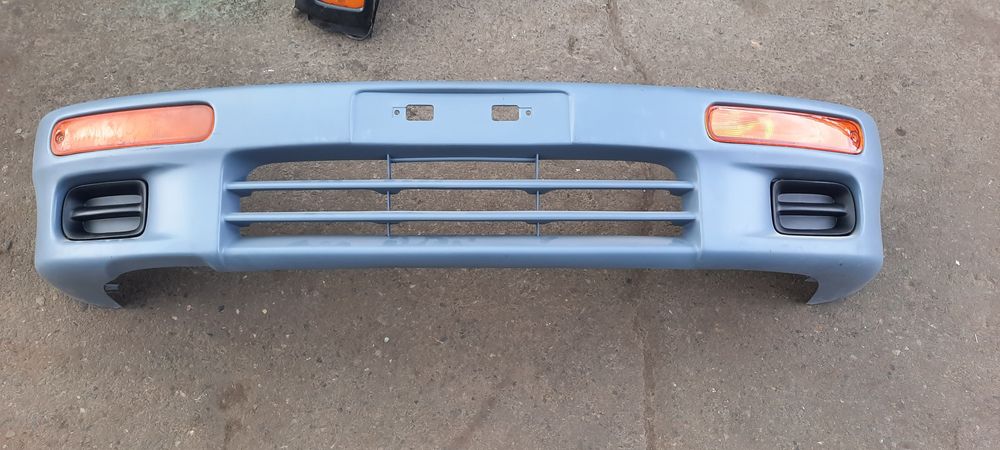 Мазда 323 BA. Седан