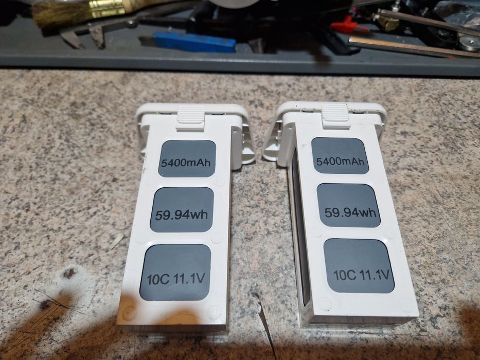 Set 2 baterii noi 6400ma si incarcator xmax