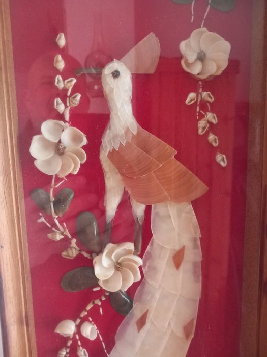 Aranjament sub formă de păun din scoici