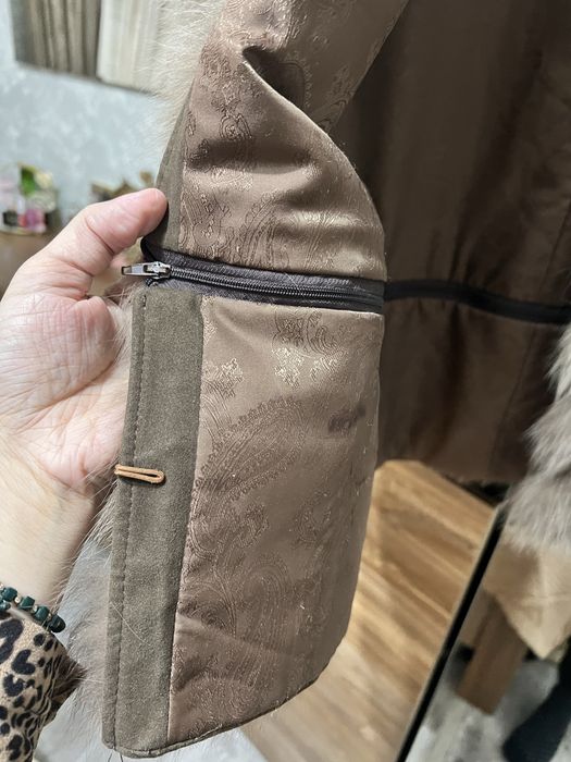 Продам меховую жилетку