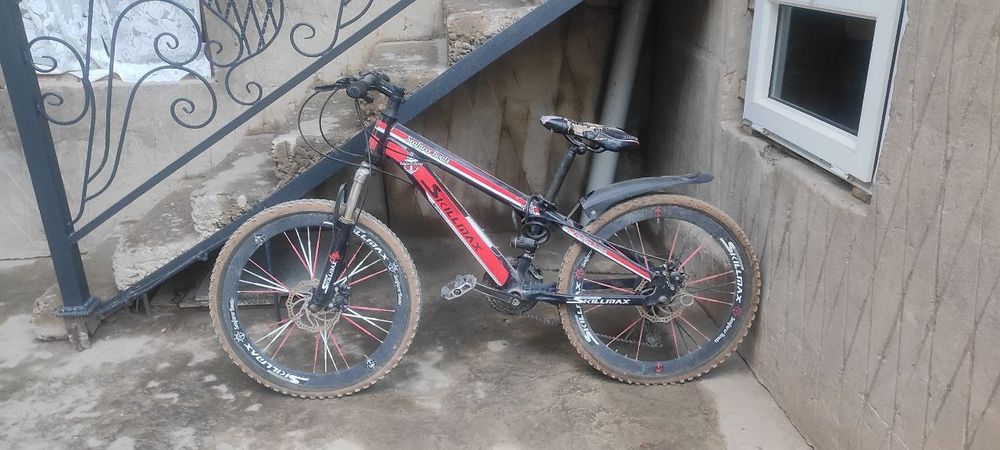 Самокат ва велосипед сотилади