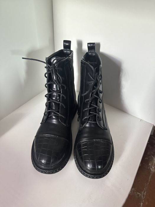 Продам новые зимние ботинки