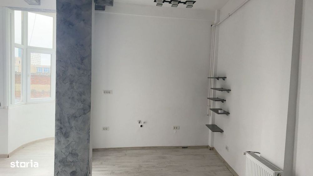 Studio de vanzare Piata Romana