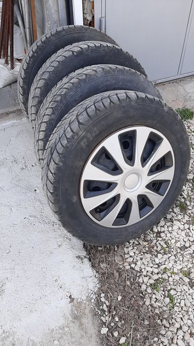 Продавам зимни гуми с железни джанти 165/70R14 за Сузуки Суифт 1.3/70R