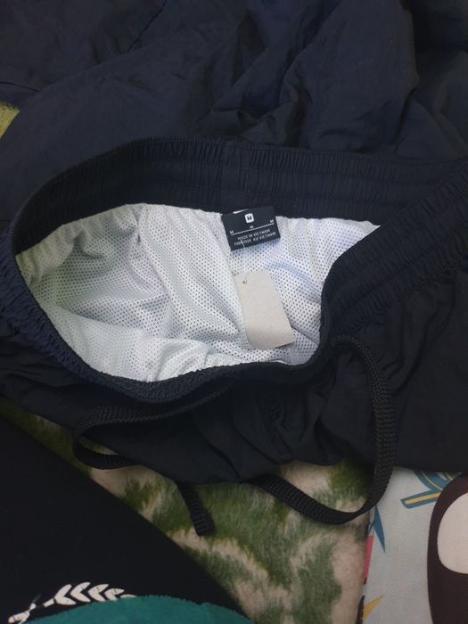Pantaloni  faini Nike original material fâș   mărimea m