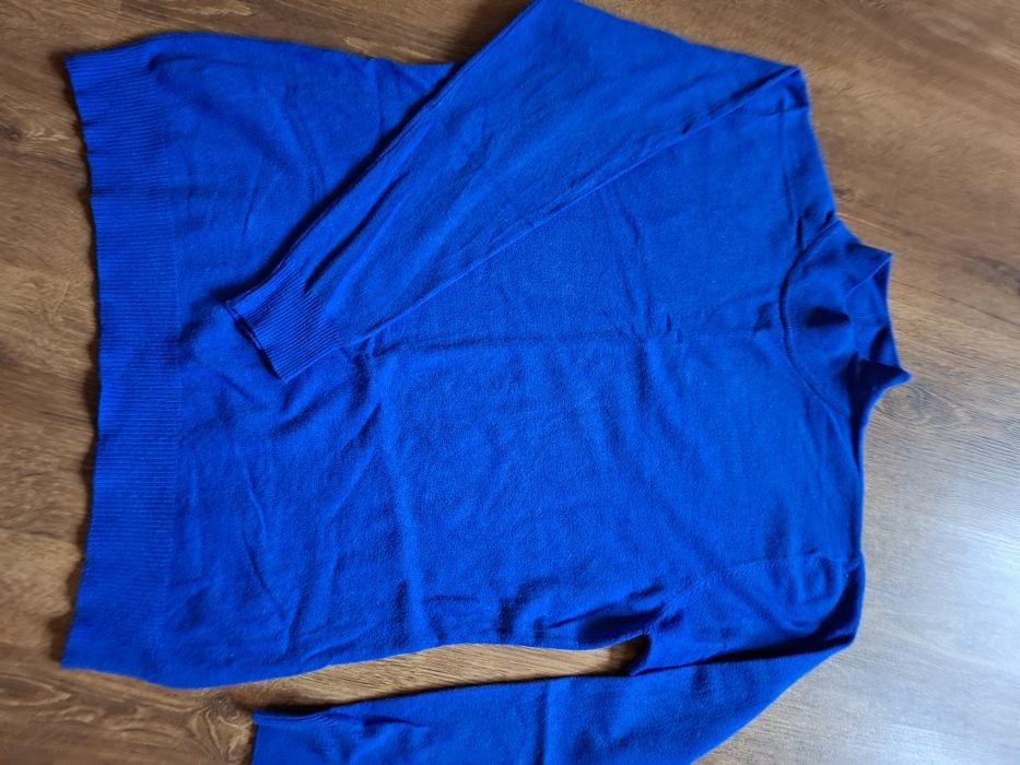 Дамски пуловери .