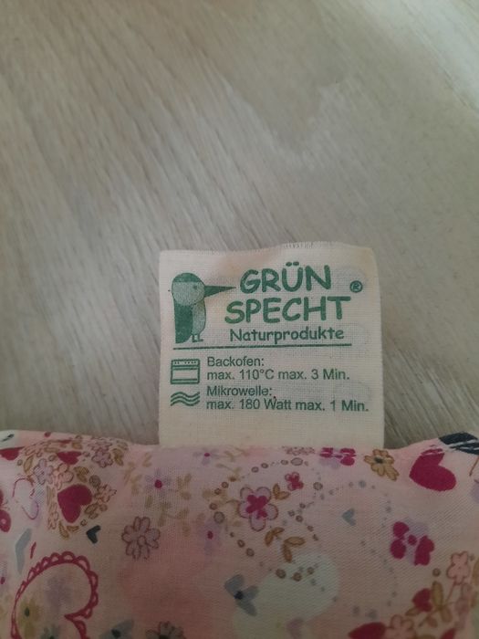 Възглавница с гроздови семки против колики и шише за хранене