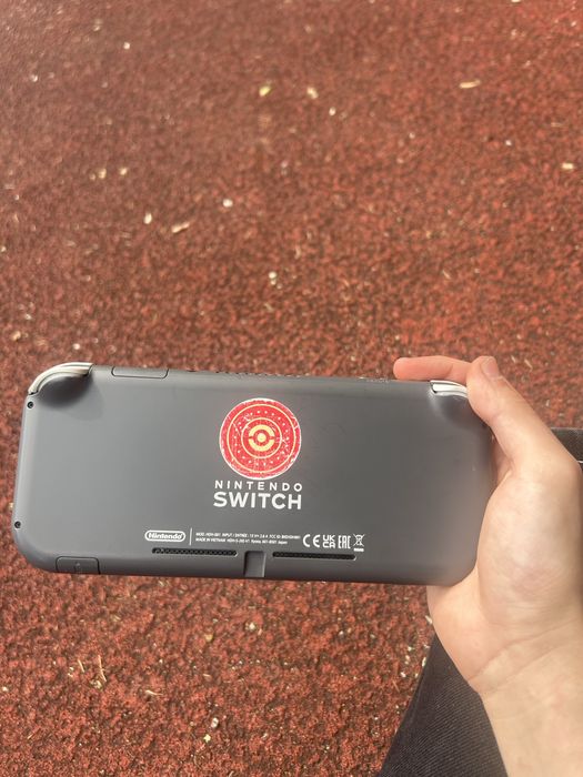 Nintendo switch lite gri aproape ca nou
