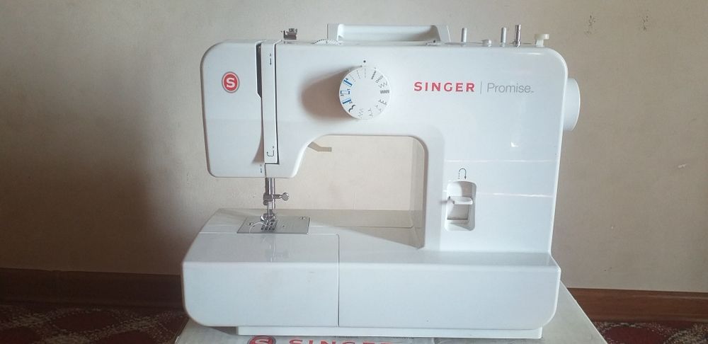 "Singer" 100%kafolat.Holati yangi ,3-4marta tikilgan,