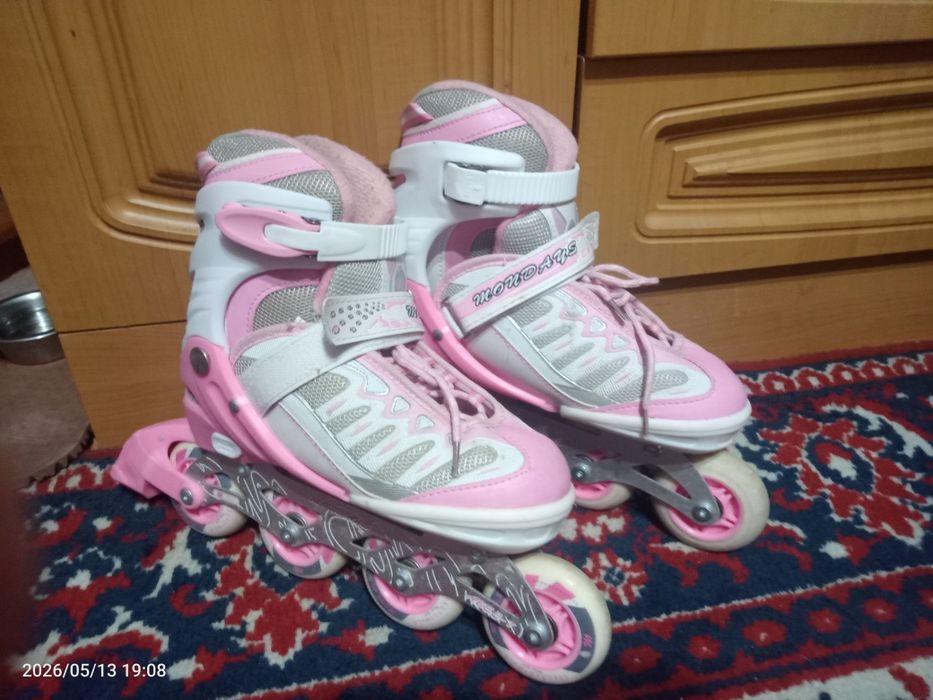 Роликовые коньки