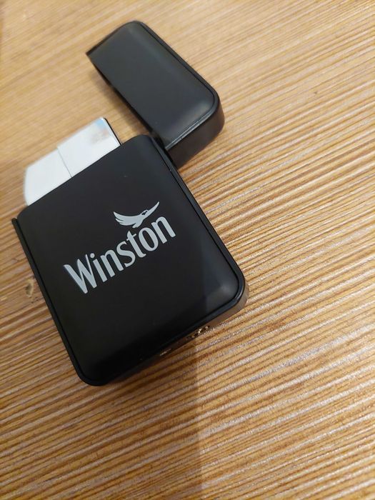 Brichetă metalica antivant reincarcabila de la Winston ,sigilata