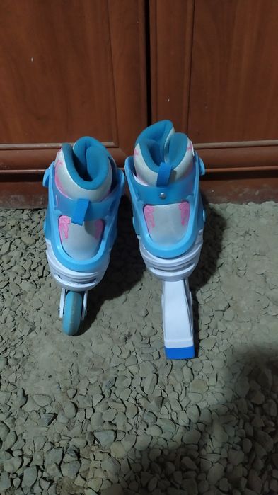 Роликовые коньки