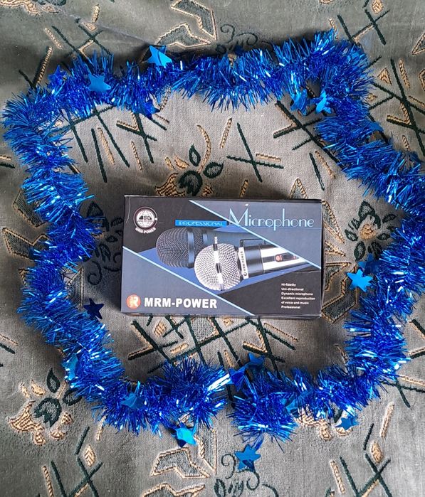 Продам микрофон новый