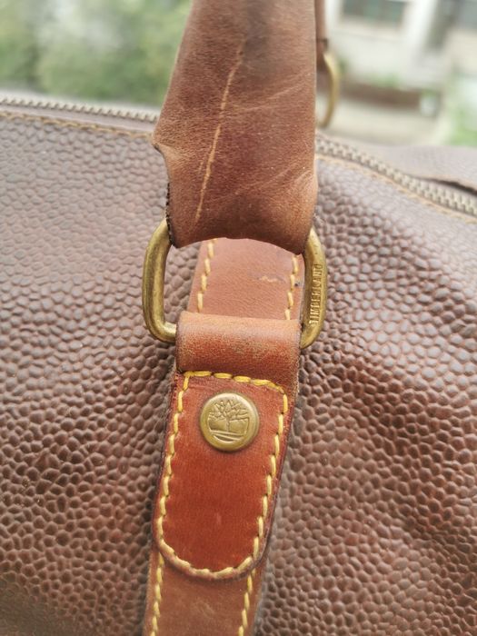 Geanta de voiaj (weekender/duffel) din piele texturată de la brandul Timberland