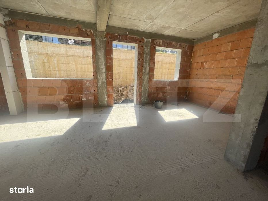 Apartament cu 3 camere, dispus pe doua niveluri, cu gradina