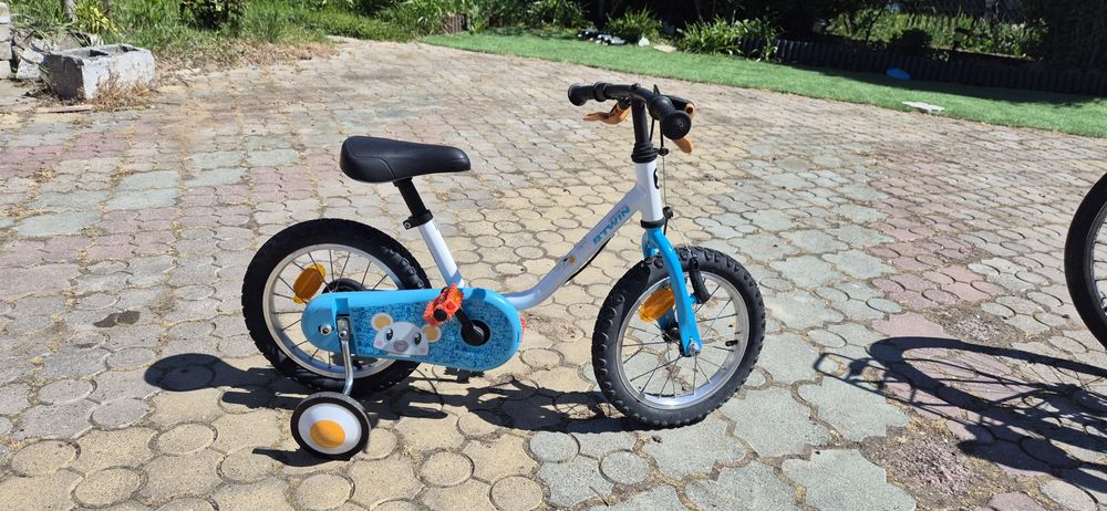Vand bicicleta BTWIN  pt. copii cu roti ajutatoare
