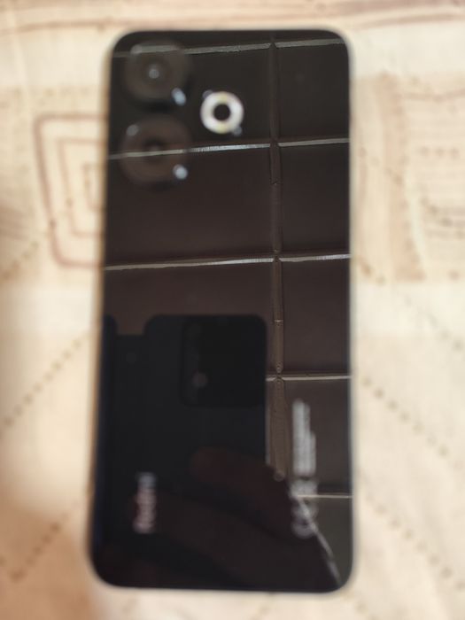 Телефон Шауми Редми 13