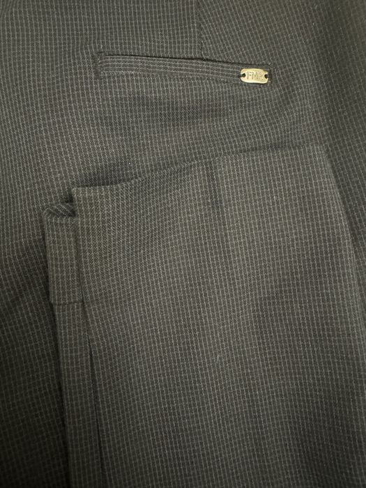 Брючные костюмы