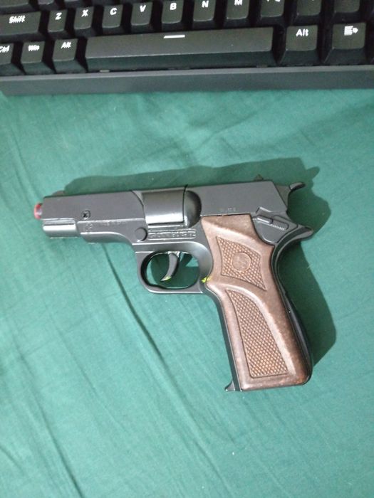 игрушечный пистолет conher