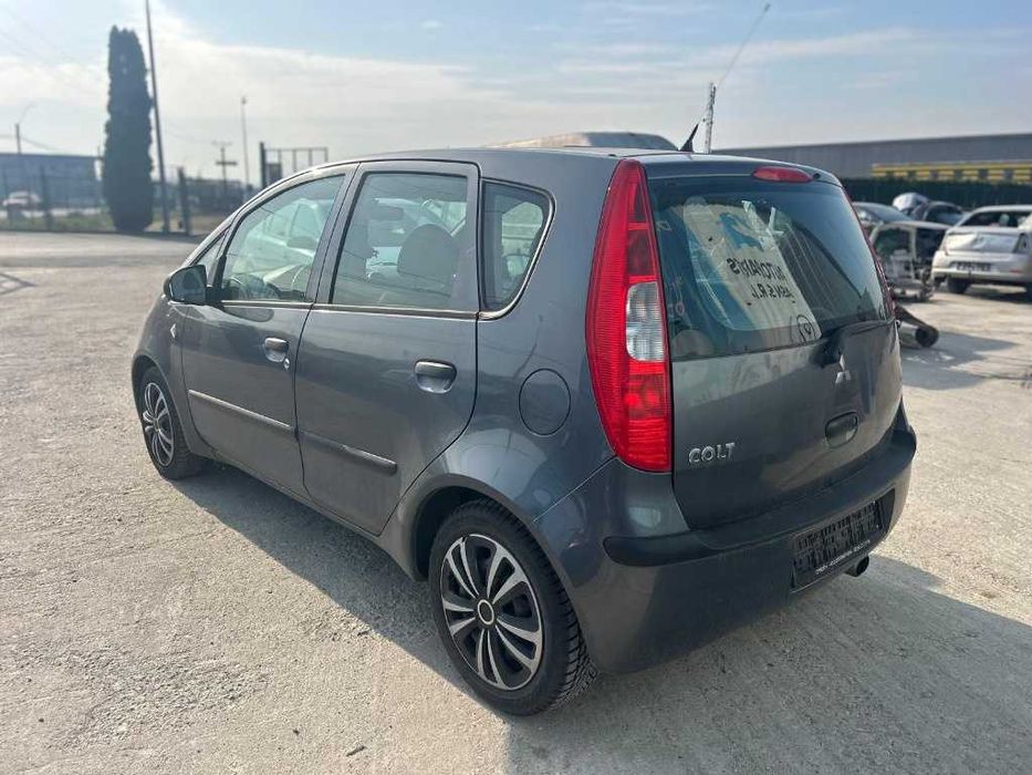 Dezmembrez Mitsubishi Colt 1.3i 2005 135.930