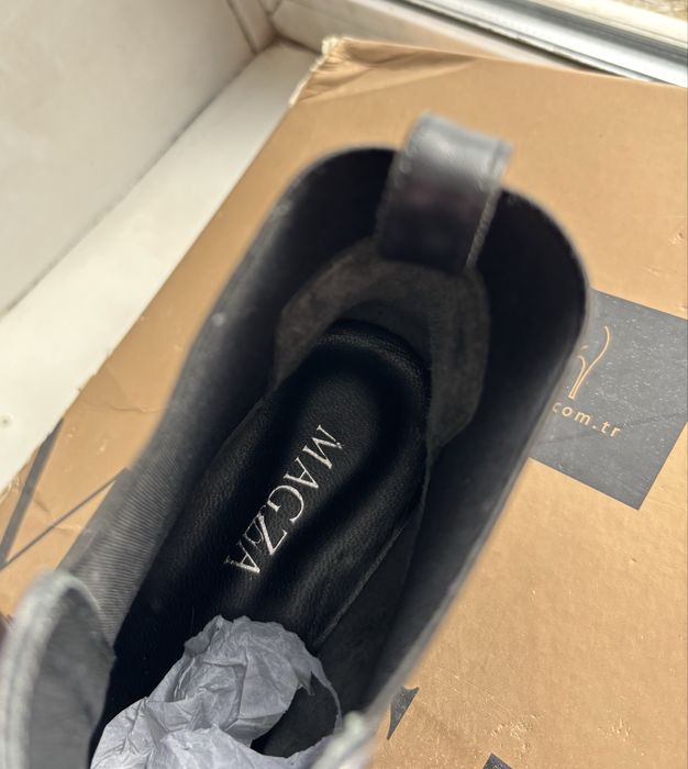 Новые женские сапоги