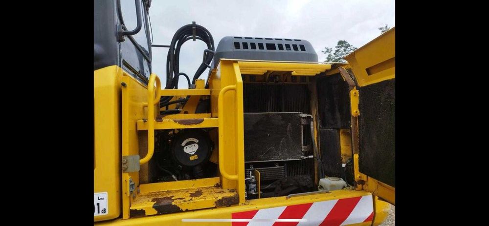 Excavator Komatsu PW 160 pe roti 16 Tone cale si lama + 3 cupe si AC